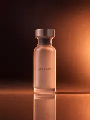 Lipo-MIC + B12 vial with LIPO-MIC imprint against a dark bronze gradient